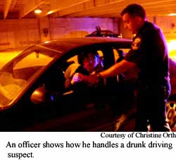 Officer approaching car